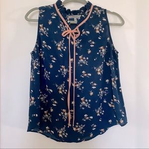 Papaya sleeveless ruffle neck top